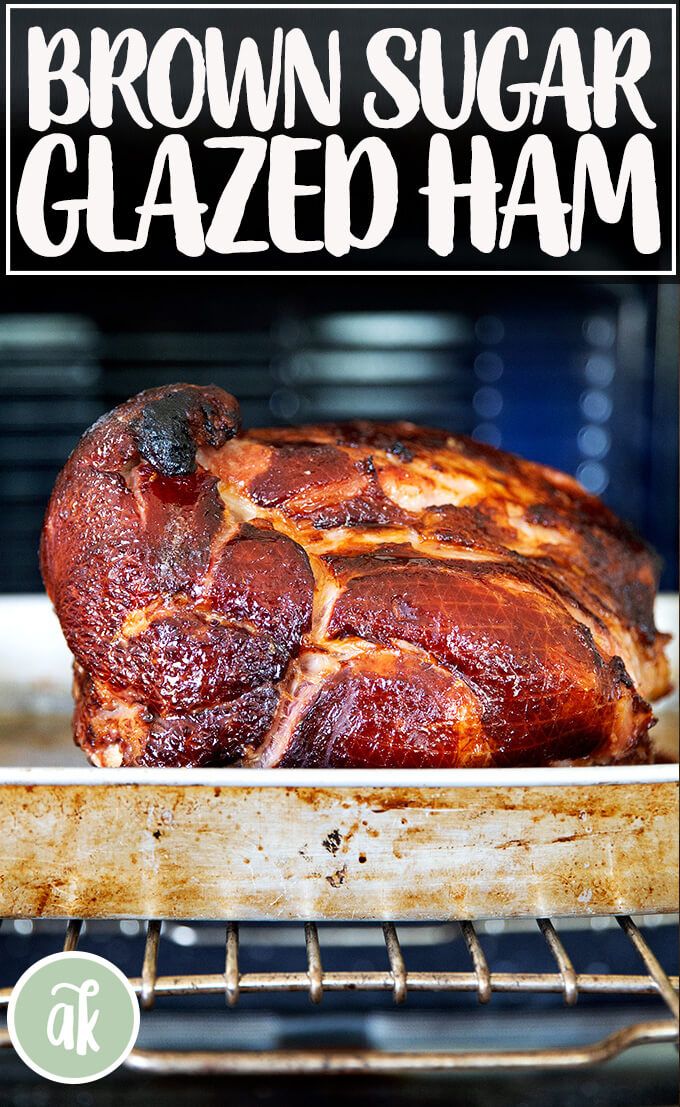 brown sugar glazed ham in the oven with text overlay that reads, brown sugar glazed ham