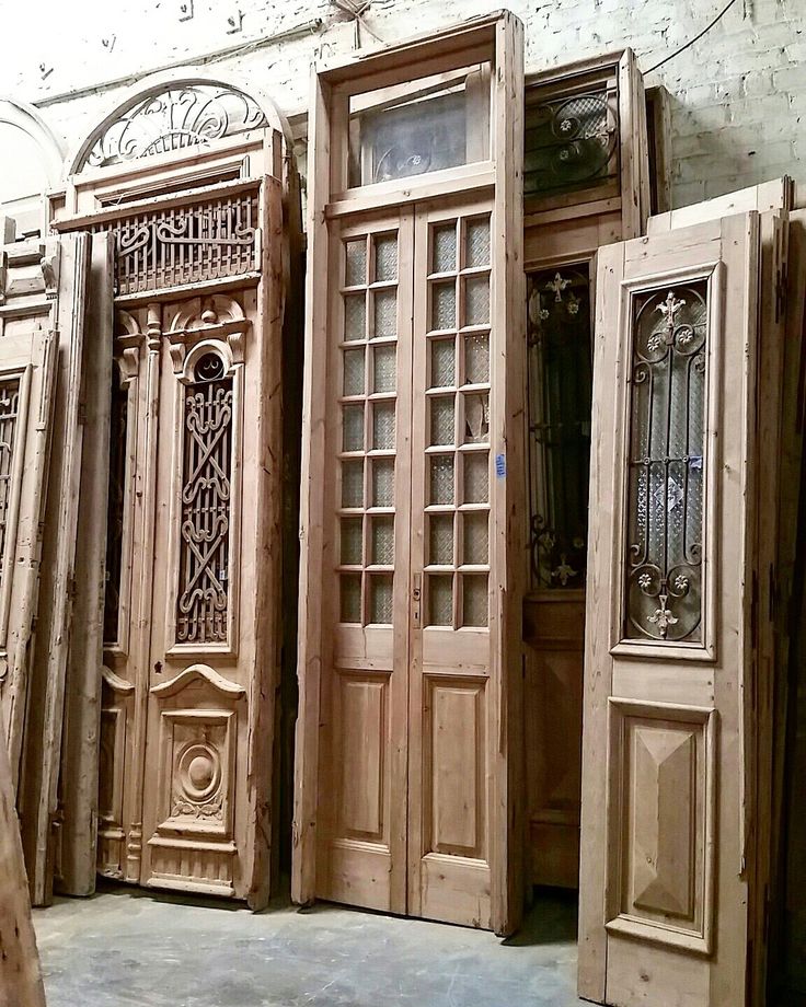 wooden doors are lined up against the wall