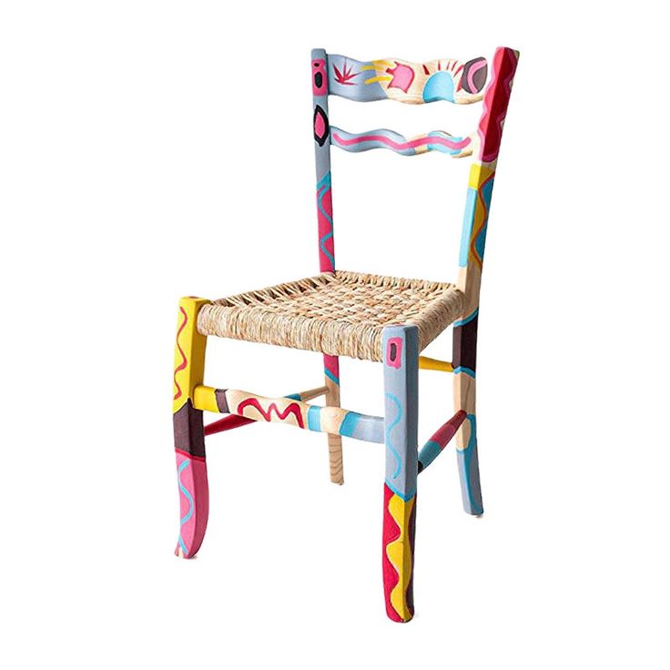 a chair made out of woven material and painted with colorful designs on it's back