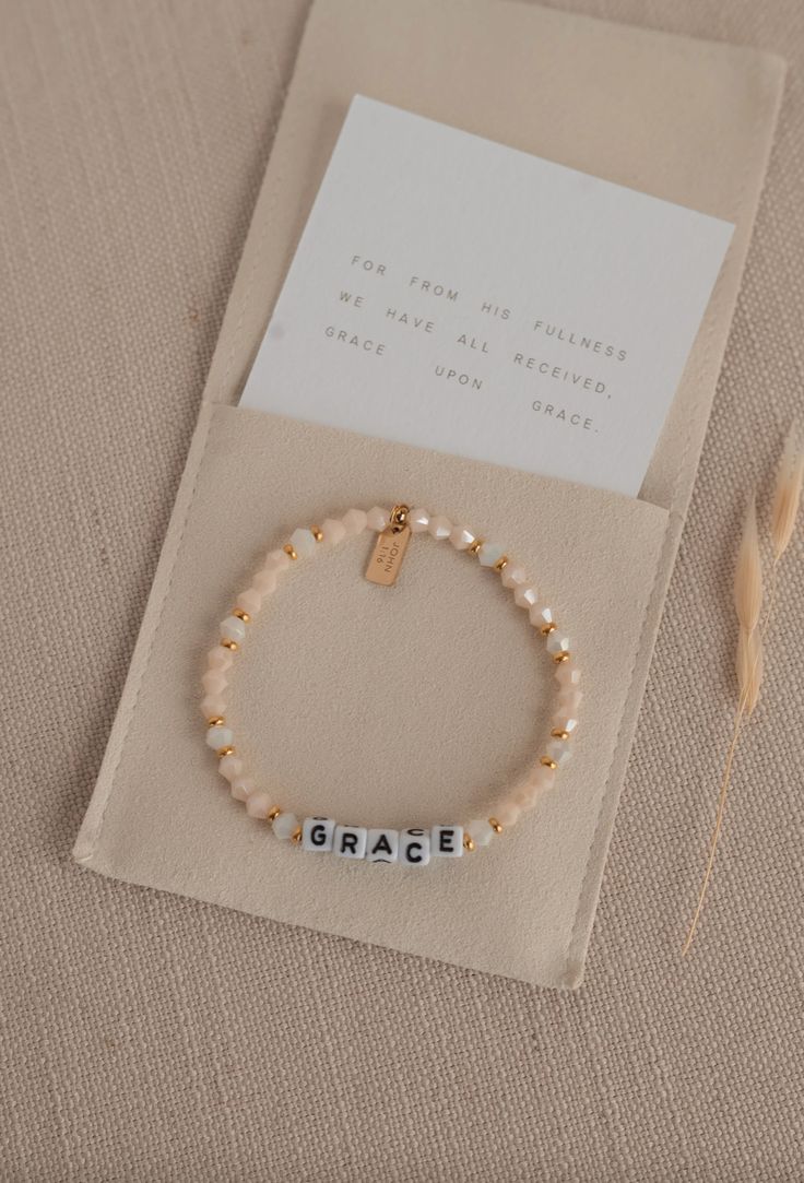 Size: 6.75" one size fits most! Details: -beaded stretch bracelet -verse reference on attached gold tag -Microfiber pouch with "From His Fullness We Have Received Grace Upon Grace" stamped onto the outside -tiny cotton card with scripture reference inside the pouch with bracelet Diy Faith Jewelry, Beaded Word Bracelet, Jesus Bracelet Ideas, Christian Diy Crafts, Christian Bracelet Ideas, Jesus Accessories, Jesus Jewelry, Christian Jewelry For Women, Jesus Bracelet