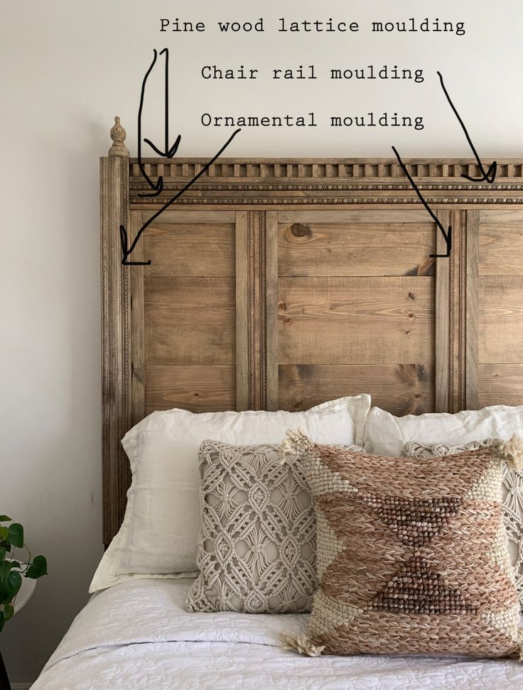 a bed with pillows and wooden headboard in front of a wall that says pine wood lattice moulding