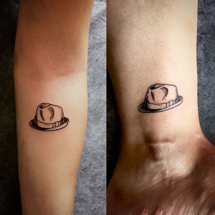 two tattoos with hats on their legs