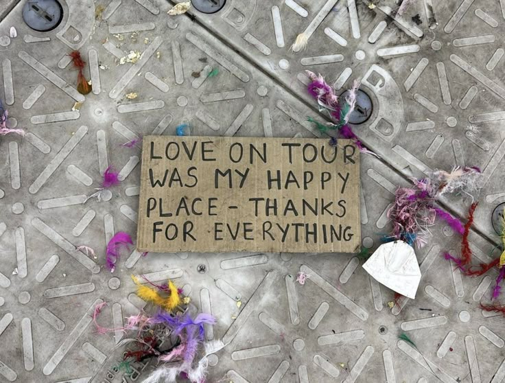 there is a sign that says love on tour was my happy place thanks for everything