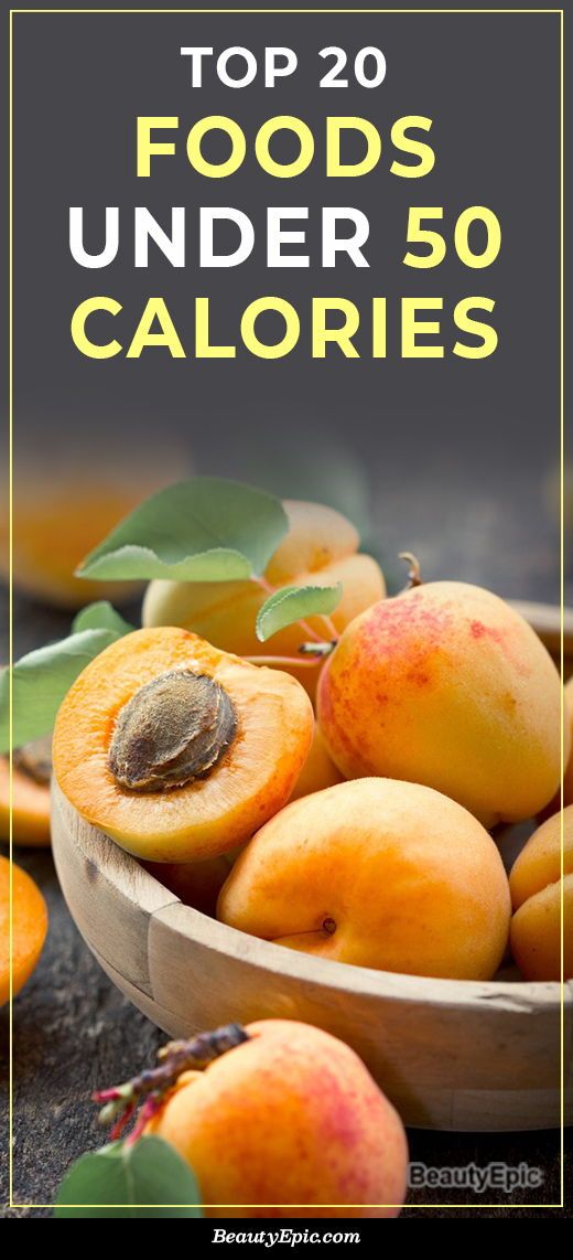 a wooden bowl filled with apricots and the words top 20 foods under 50 calories