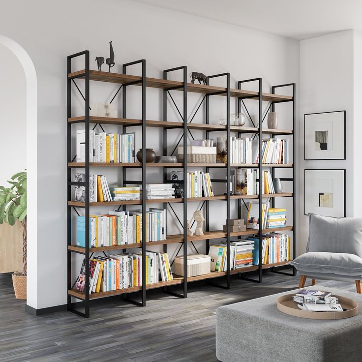 a living room filled with lots of books