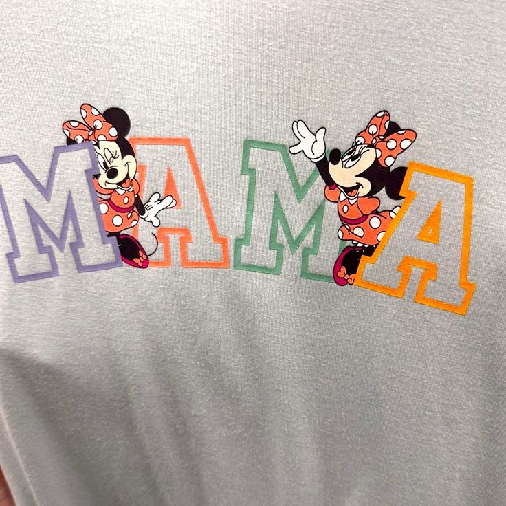 Brand New With Tags Light Blue Super Soft Tee Shirt With “ Mama” In Multicolored Block Letters Disney Tops, Block Lettering, Mama Shirt, Minnie Mouse, Colorful Shirts, Tee Shirts, Womens Tops, Tops & Tees, Disney