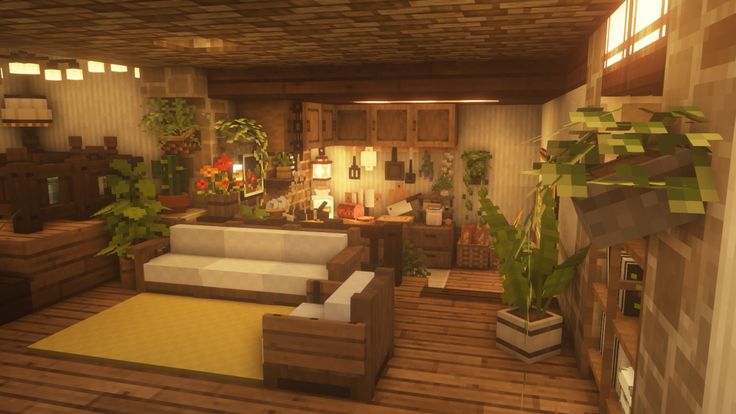 a living room filled with lots of furniture and plants on top of wooden flooring