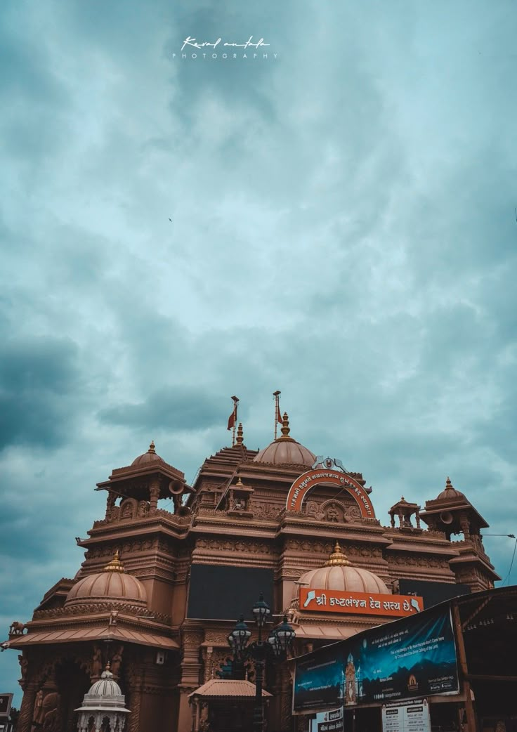 an ornate building with a sky background