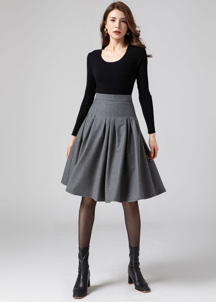 "★★FEATURE Wool blend fabric -25% wool, other fiber, nylon polyester lining Fitted waist No pockets High waist Right zipper closure Skater skirt Above knee length skirt Perfect for winter, autumn Dry clean ★★Mode size Height 170 cm (5′ 7″)  Bust 84 cm (33\")  Waist 66 cm (26\")  She wears size XS ★★ Please select custom order according to the follow situation Your height is not between 155 cm- 172 cm Your weight is over 75 kg Request the length ★★ Get your size in Size Chart with your body measu Elegant Gray Flowy Skirt, Winter Pleated Fitted Mini Skirt, Pleated Mini Skirt For Winter, Fall Fitted Mini Skirt With Pleated Waist, Fitted Long Pleated Skirt For Fall, Pleated Long Skirt For Winter, Long Pleated Skirt For Winter, Winter Pleated Flowy Skirt, Stretch Gray Skirt With Lining