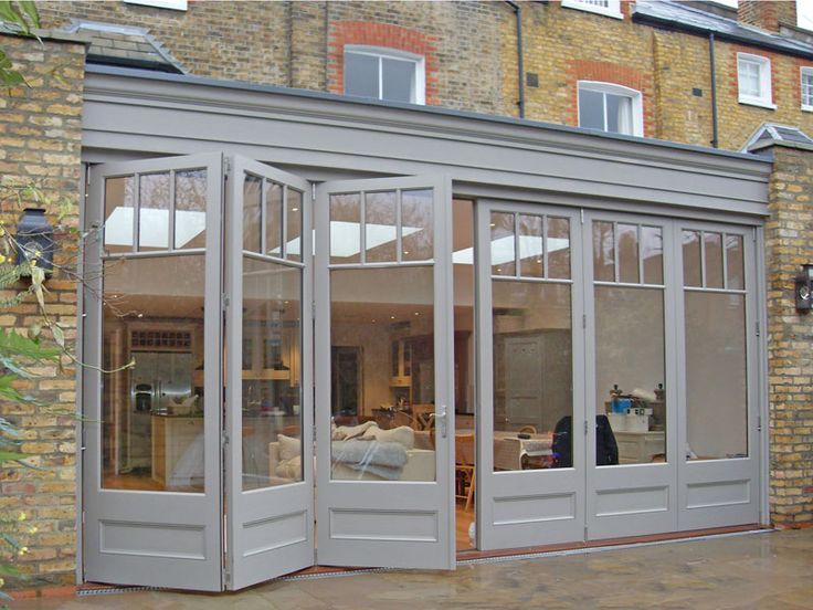 an open patio with french doors and windows