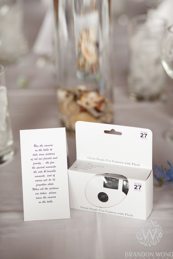 the table is set with empty wine glasses and place cards for guests to take pictures