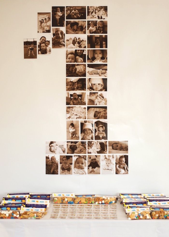 a table topped with lots of food and pictures on the wall next to each other