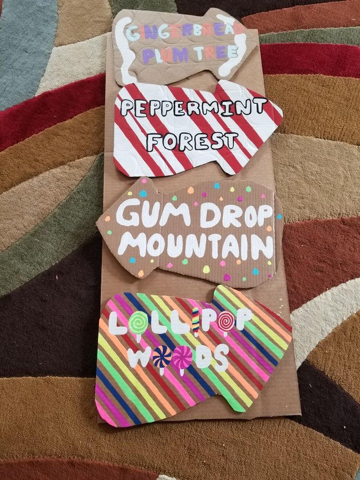 there is a sign that says gum drop mountain on the side of a paper bag