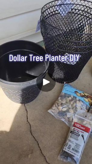 the dollar tree planter diy is sitting on the concrete