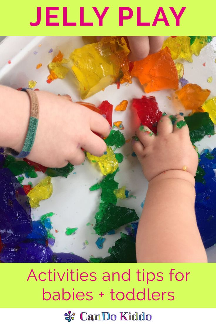 a child playing with gummy bears in a play tray and text overlay that reads jelly play activities and tips for babies and toddlers