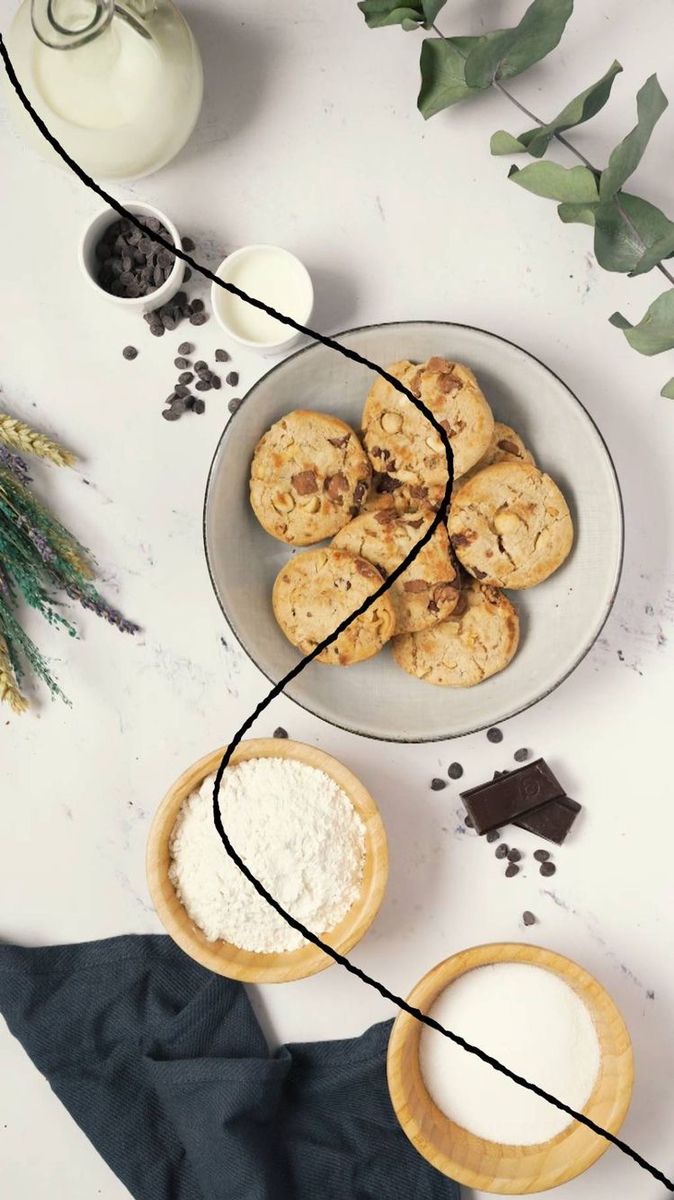 cookies and other ingredients on a white table