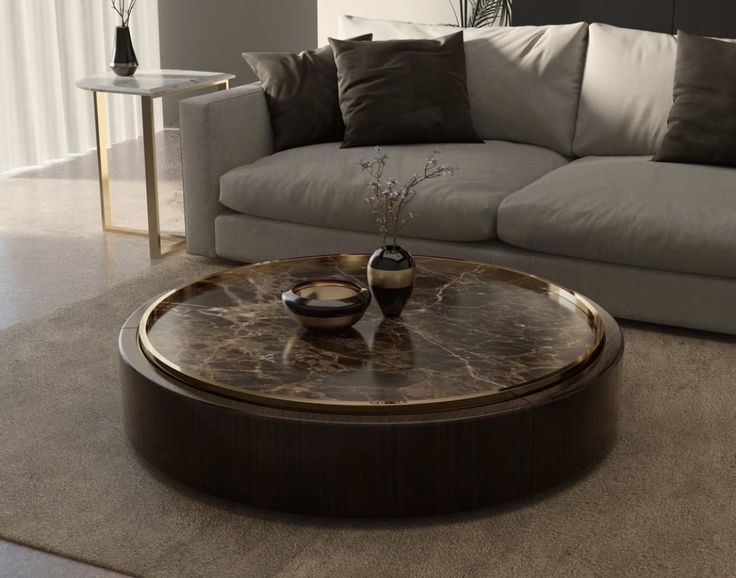 a living room with a couch, table and two vases on the coffee table