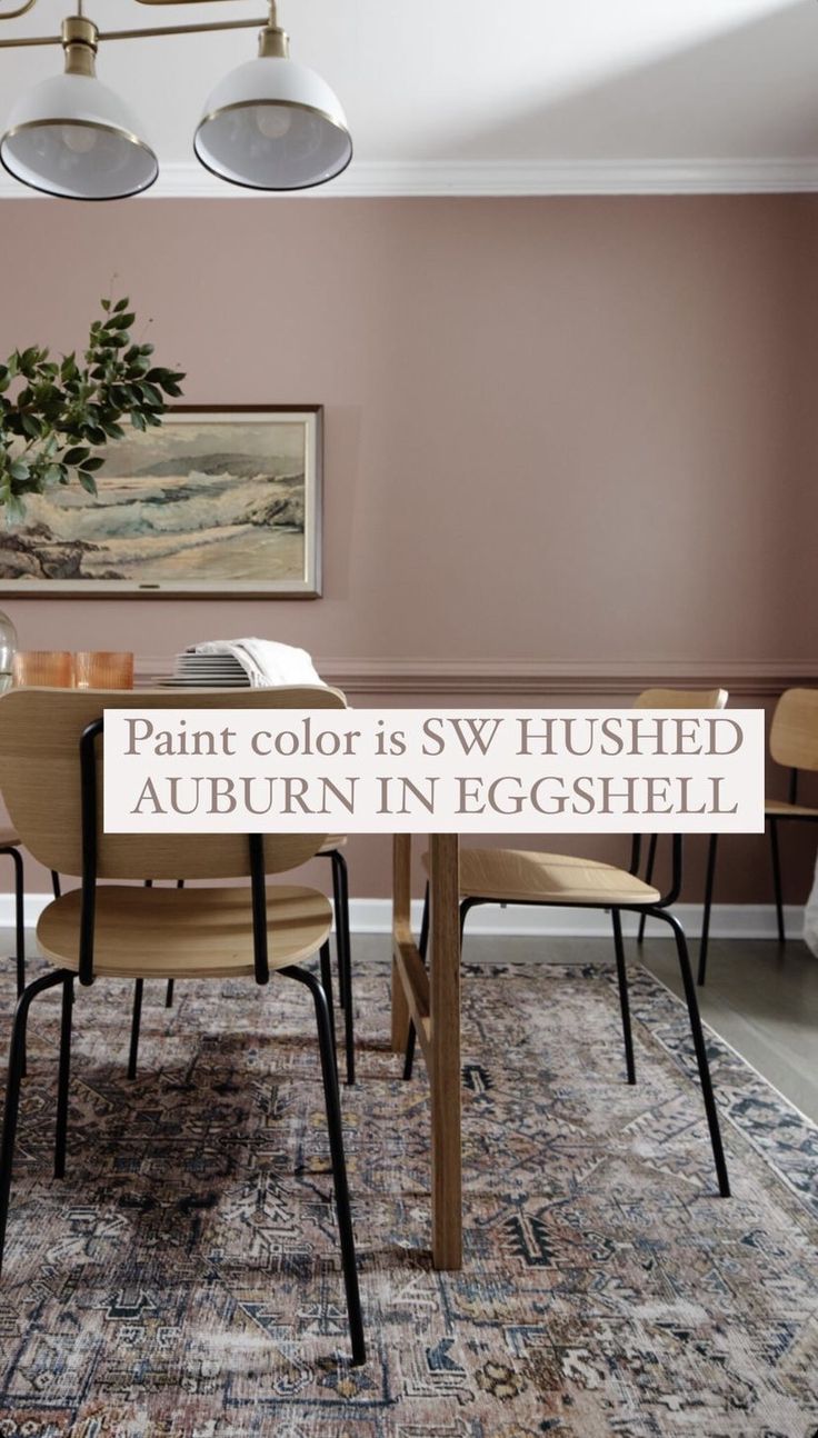 an image of a dining room with pink walls and rug on the floor that says paint color is swishshed auburn in eggshell