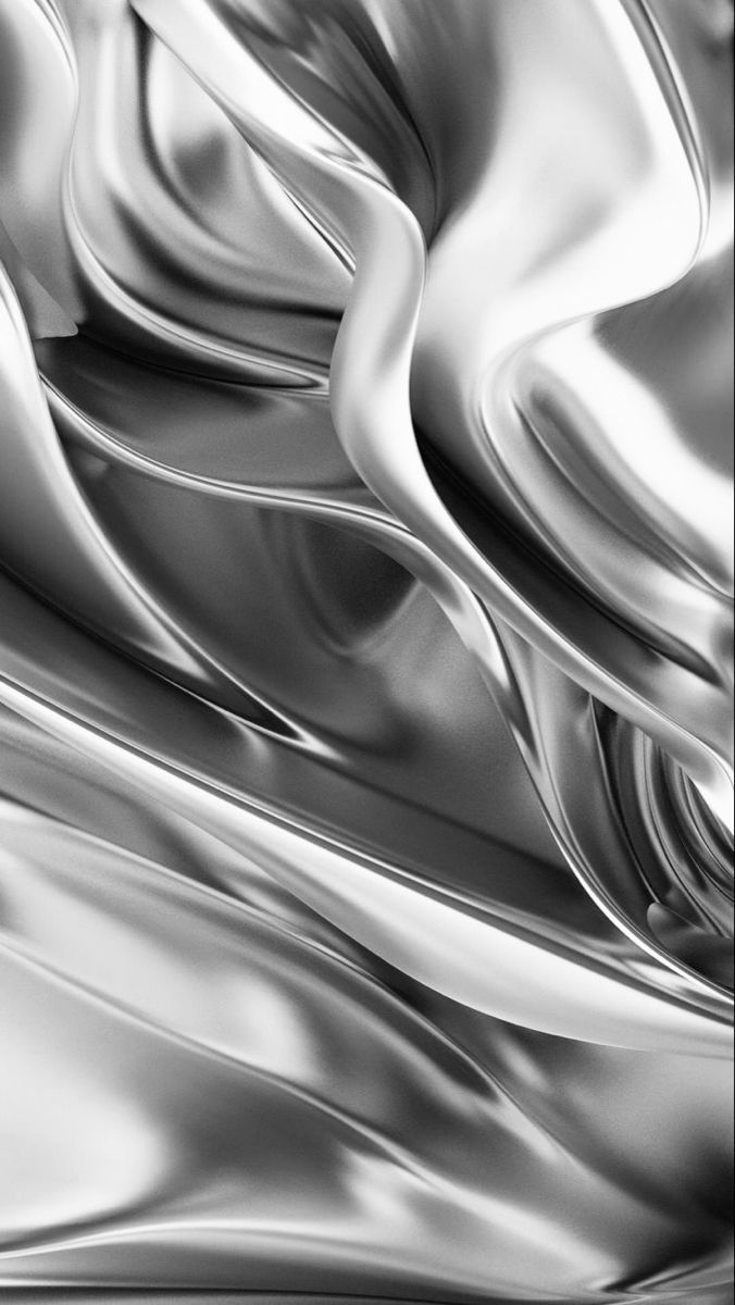 black and white photograph of wavy metal material with high contrast to the image in full color