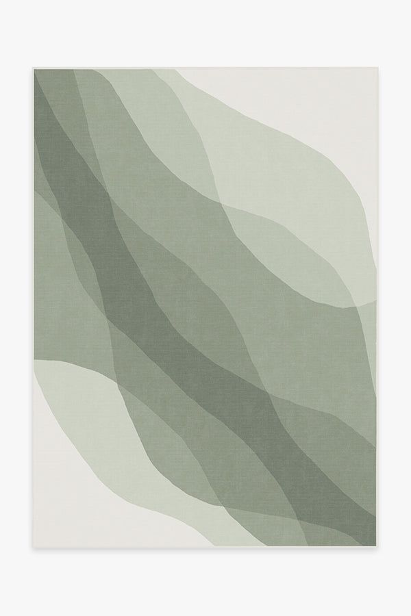 an abstract green and white painting with wavy lines in the center, on a light grey background