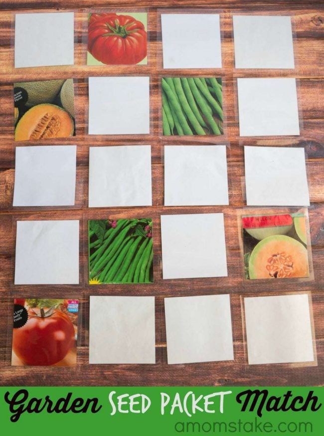 the garden seed packet match is displayed on a wooden table with white papers and green beans