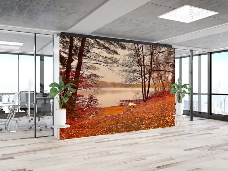 an office with a large wall mural in the middle