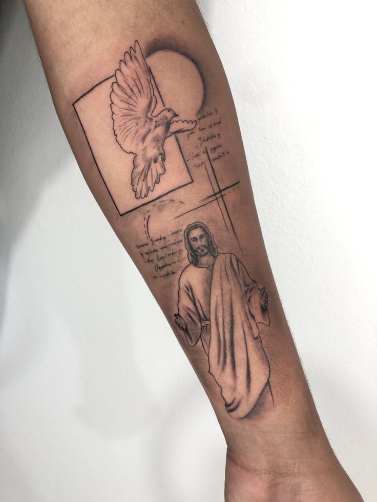 a person with a tattoo on their arm and the image of jesus holding a dove