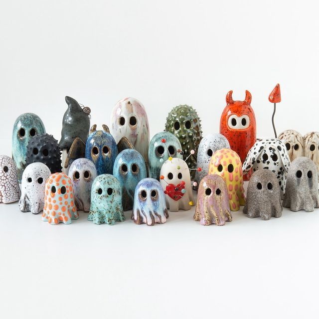 a group of small figurines sitting next to each other