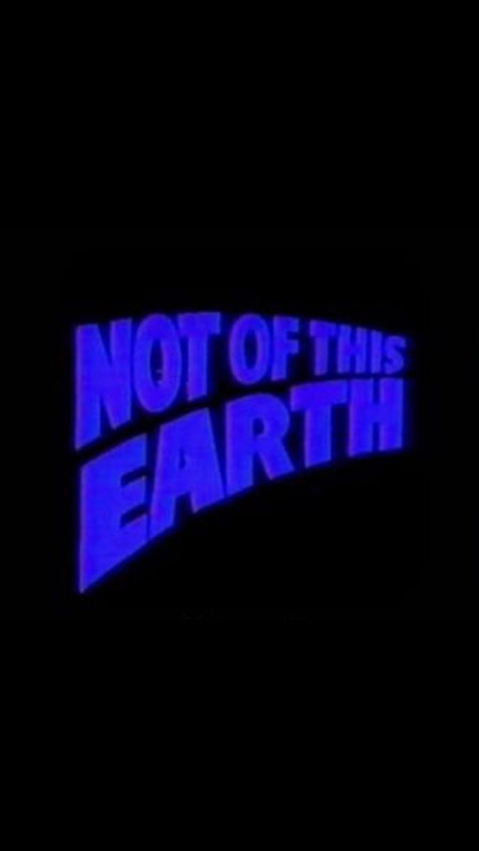 the title for not of this earth, written in neon blue on a black background