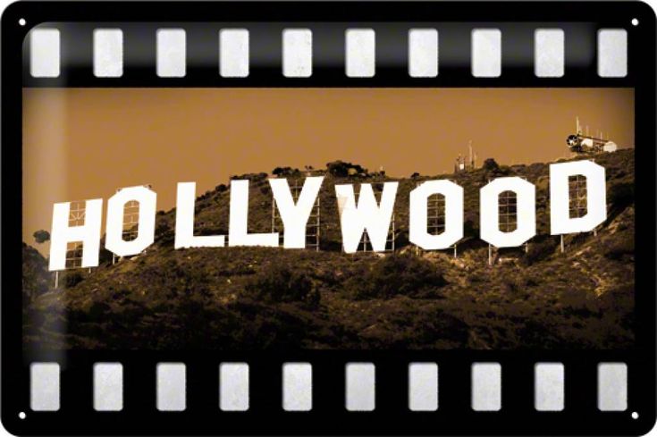 the hollywood sign is shown on top of a hill