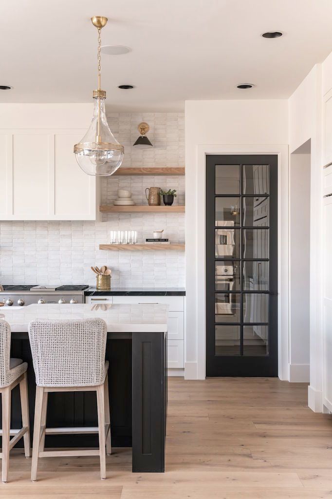 the kitchen is clean and ready to be used as a dining room or living area