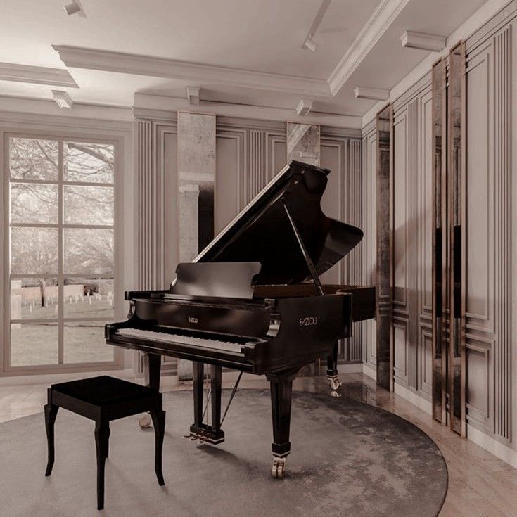 a grand piano sits in the middle of a room