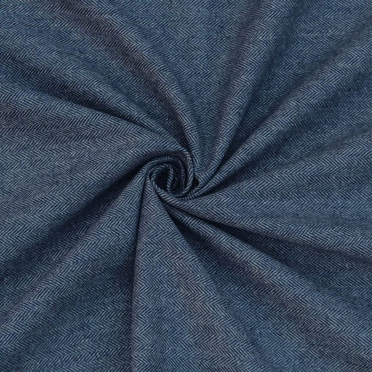 the fabric is blue and has a very thin line pattern on it's side