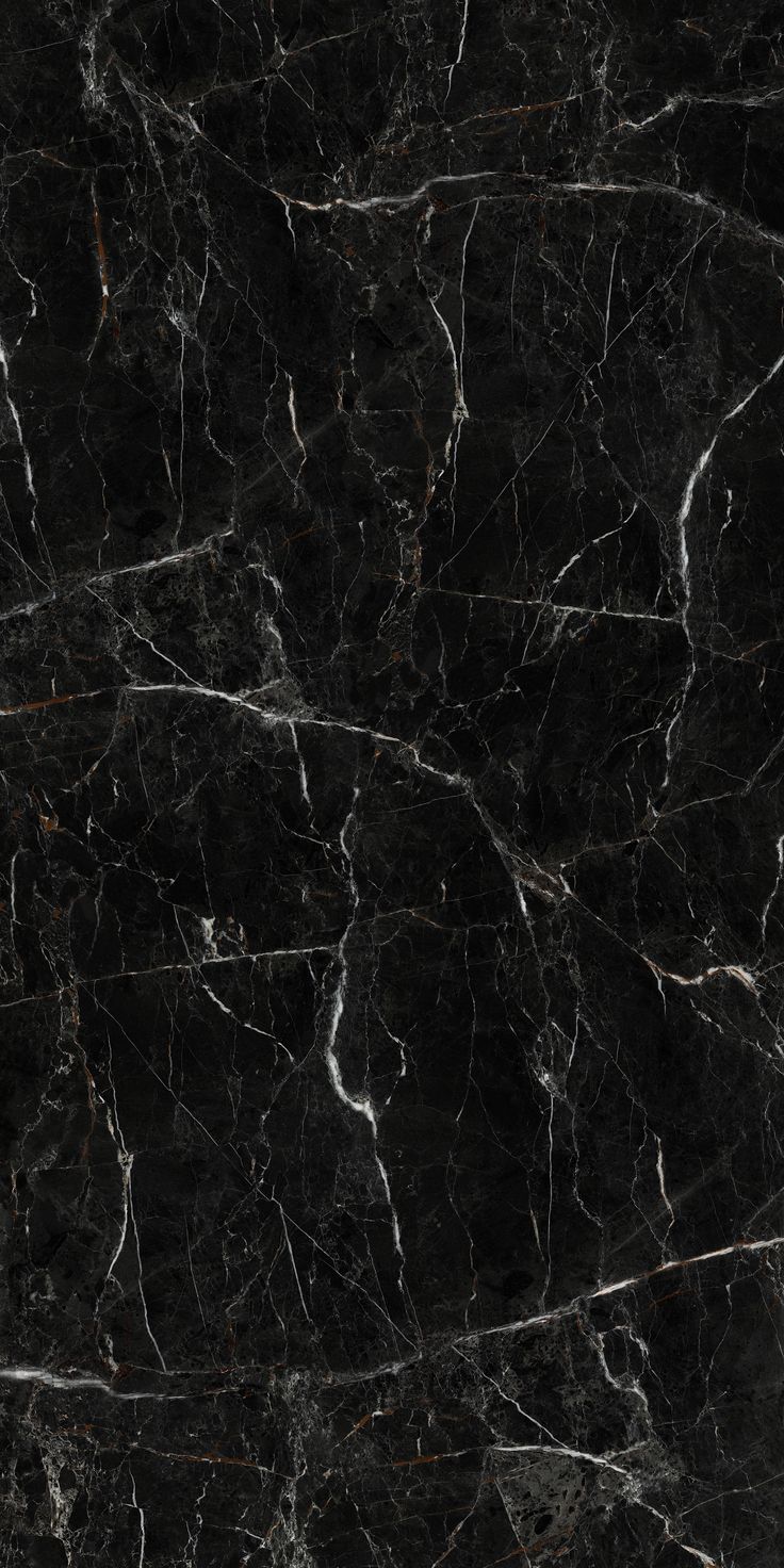 black marble textured with white streaks and dark gray veining on the top right side