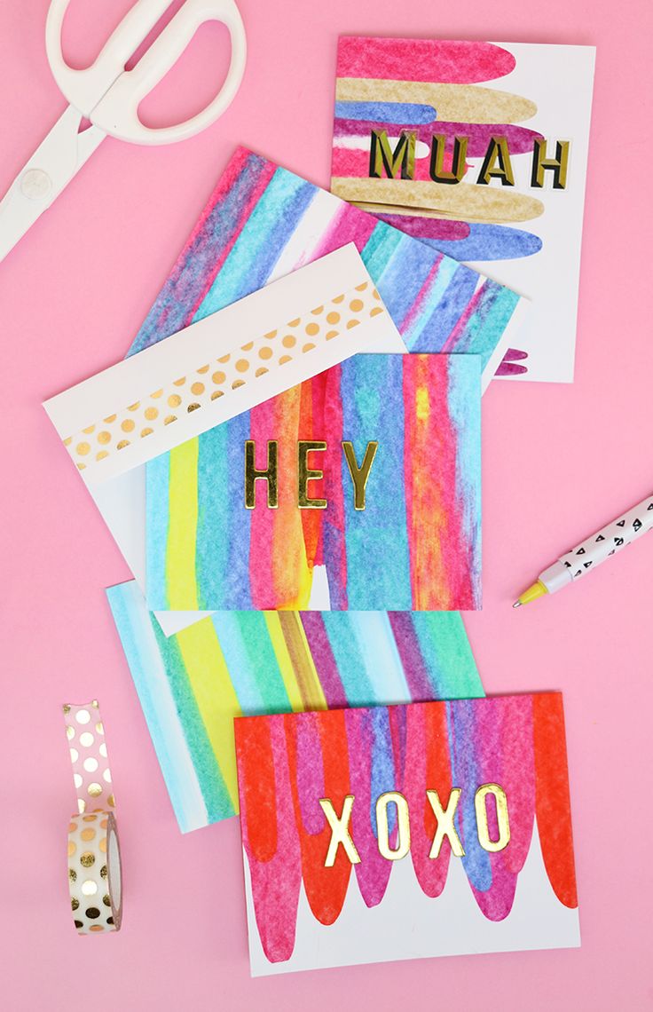 some colorful cards and scissors on a pink background with the words hey xoxo