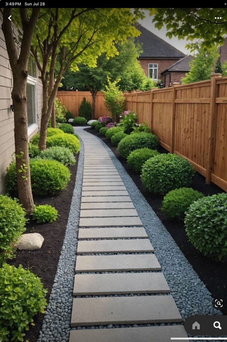 a garden path is shown in the middle of a yard