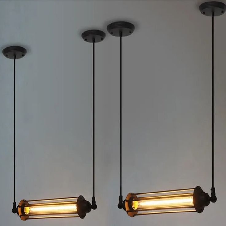 three light fixtures hanging from the ceiling