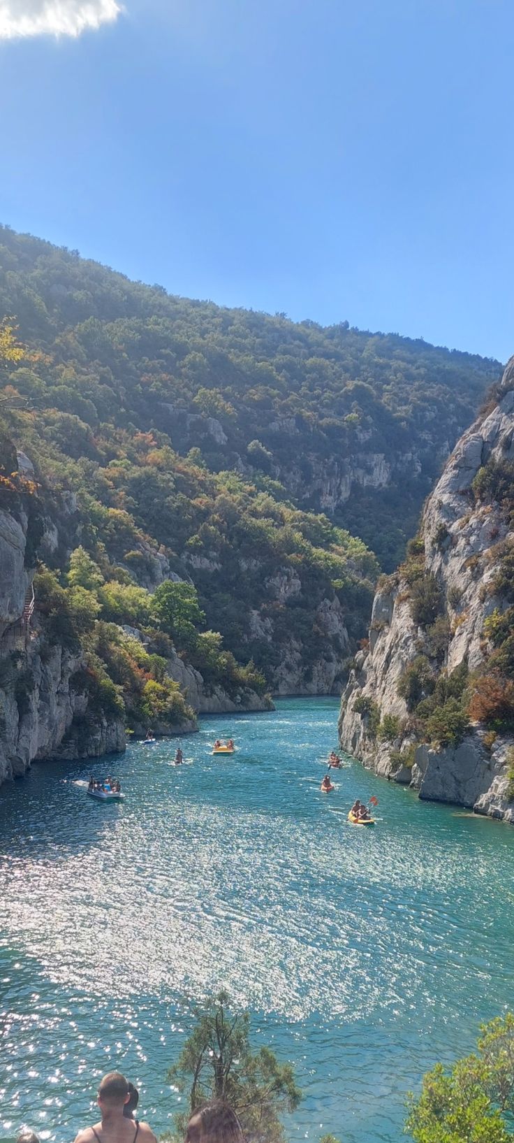 Blue river surrounded by grey mountains with boats Holidays Aesthetic, Travel In France, Summer Mountains, Aesthetic Places, French Summer, France Aesthetic, Streets Of Paris, Places In Europe, Europe Summer