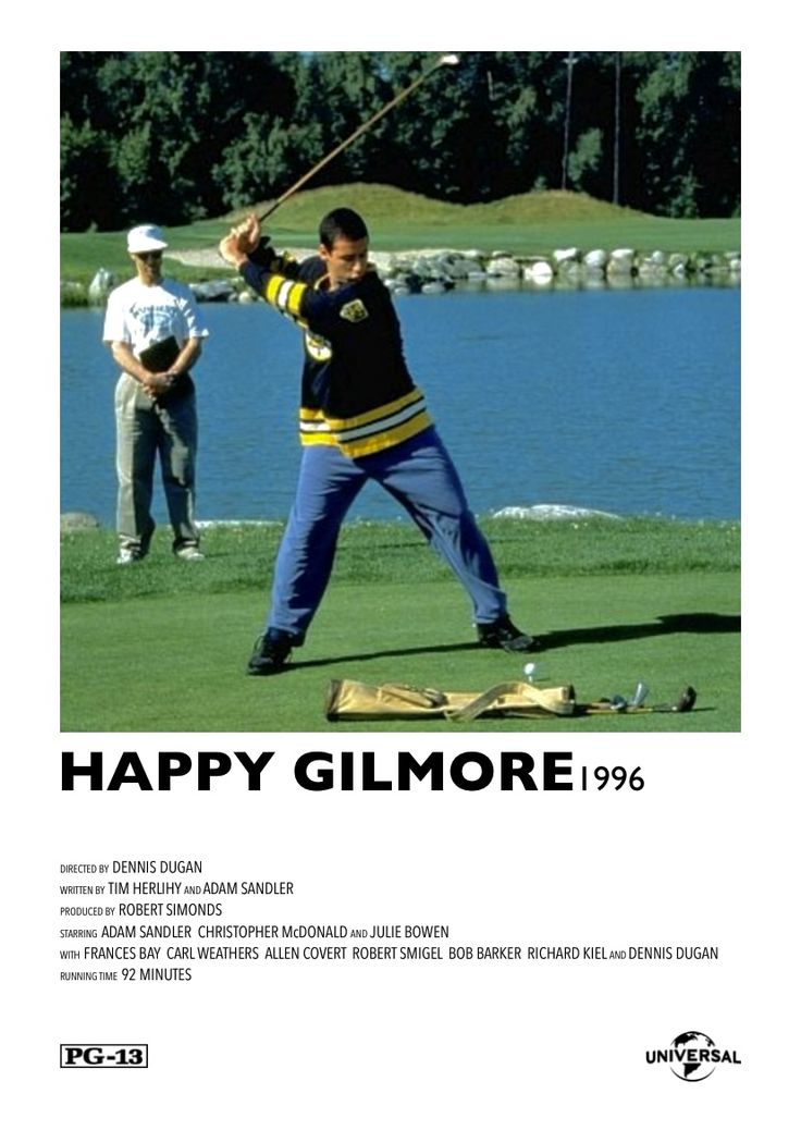 a man swinging a golf club on top of a green grass covered field next to a lake