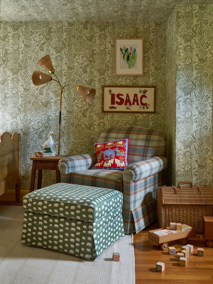 a living room filled with furniture next to a wooden table and lamp on top of a hard wood floor