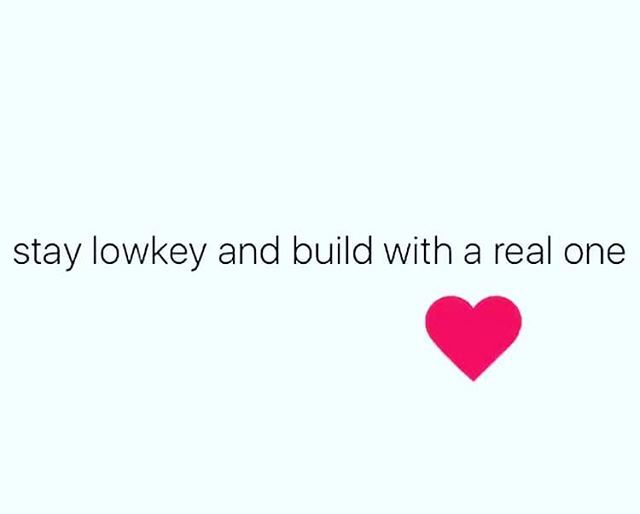 a pink heart with the words stay low key and build with a real one