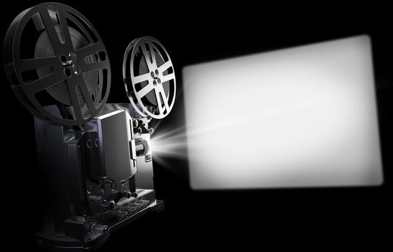 a black and white image of a film projector with light coming from the lens