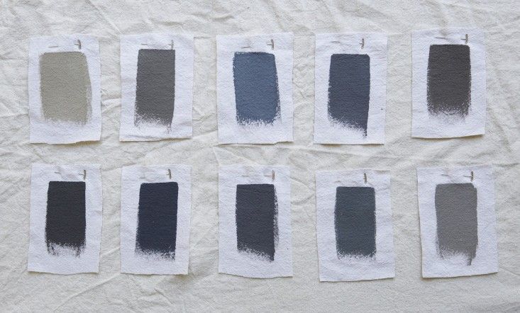 six different shades of gray paint on white paper