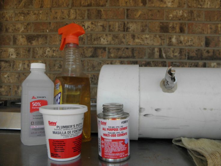 the contents of a disposable container are sitting on top of a metal counter