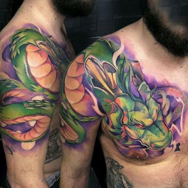 two men with dragon tattoos on their chests, one is green and the other is orange