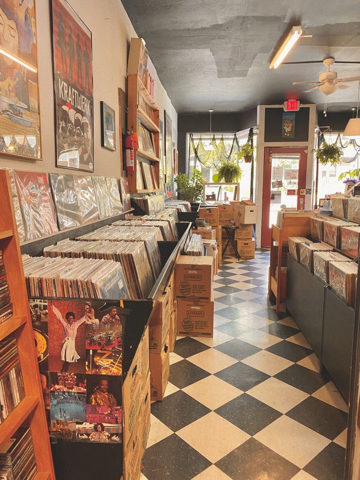 the inside of a record store with records on display