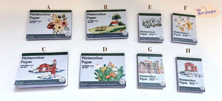 the four booklets are arranged in order to show their different types of flowers and plants