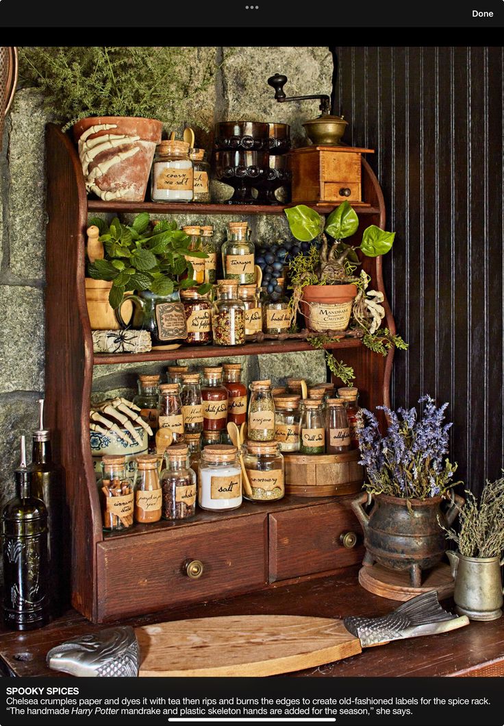 an old wooden shelf filled with jars and containers