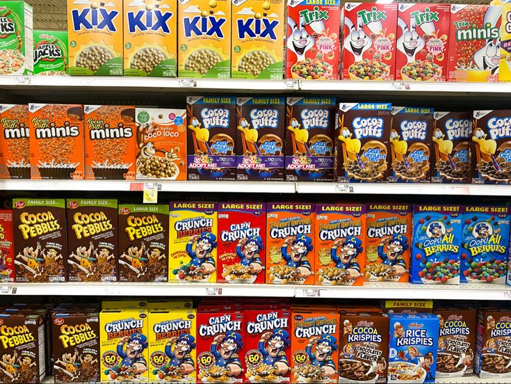 cereal and cereal bars are on display in a store