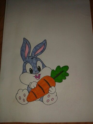 a drawing of a bunny holding a carrot